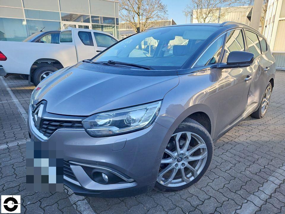 Frontansicht schräg rechts, grauer Kompaktvan, keine sichtbaren Schäden